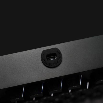 MonsGeek M3 V5 HE bottom view showing ball-catch tool-free quick-release mechanism, demagnetized plate-mounted stabilizer wires, and magnetic switch hot-swap sockets